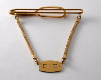 Vintage Forstner 1/20 12kt G.F "CID" Iniciales en cadena tie clip firmado EE.UU.