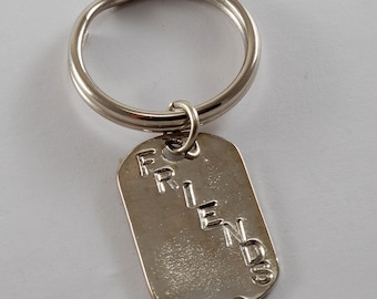 Portachiavi vintage in ottone placcato oro lucido a forma di ferro di cavallo con passante, nuovo, vecchio stock - Italia