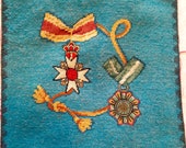 Petit-point and needlepoint military medal theme pillow