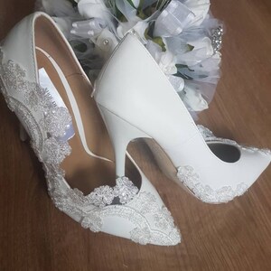 white lace court shoes
