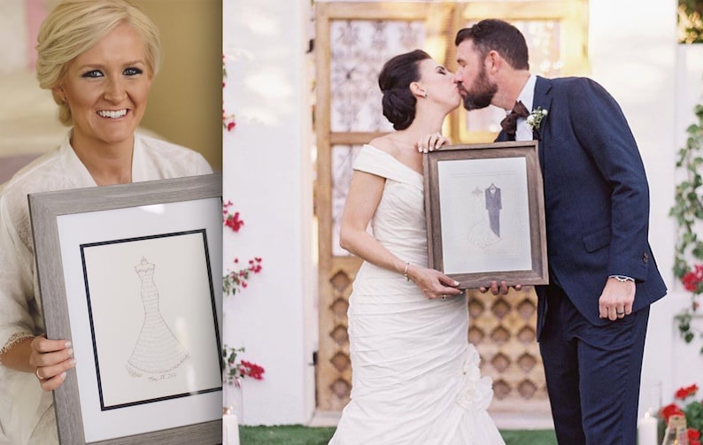May include: A framed drawing of a wedding dress and a suit, with the bride and groom kissing in the background.