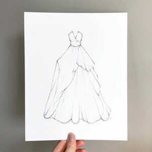 May include: A line drawing of a wedding dress with a sweetheart neckline and a flowing skirt.