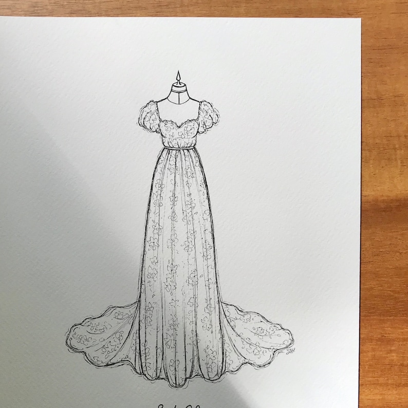 May include: A black and white line drawing of a wedding dress with a sweetheart neckline, short puff sleeves, and a full skirt.