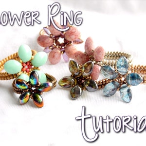 May include: Five flower rings made with beads. The rings are in different colors, including pink, green, blue, and brown. The rings are all made with the same technique, and they are all very beautiful.