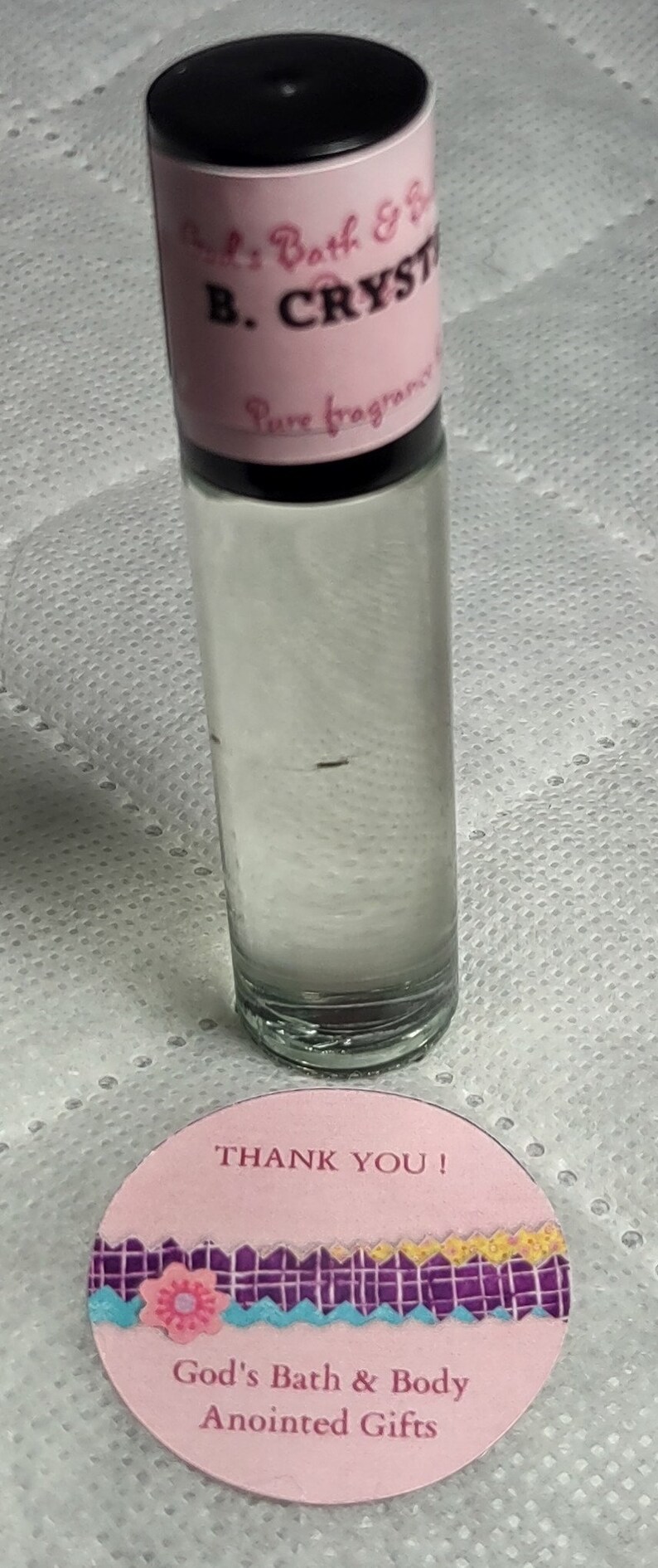 Fragrance Roll-On Body Oils 1/3oz bottle. Our impression of all our fragrances. B. Crystals (L)