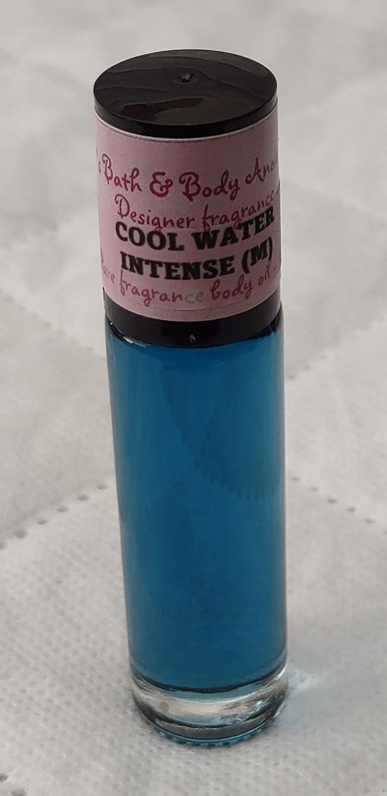 Fragrance Roll-On Body Oils 1/3oz bottle. Our impression of all our fragrances. Cool Water Intense-M