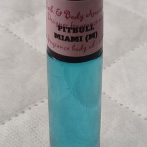 Fragrance Roll-On Body Oils 1/3oz bottle. Our impression of all our fragrances. Pitbull Miami (M)