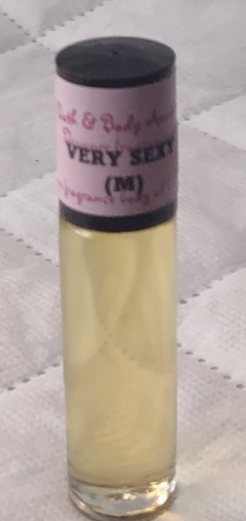 Fragrance Roll-On Body Oils 1/3oz bottle. Our impression of all our fragrances. Very Sexy (M)