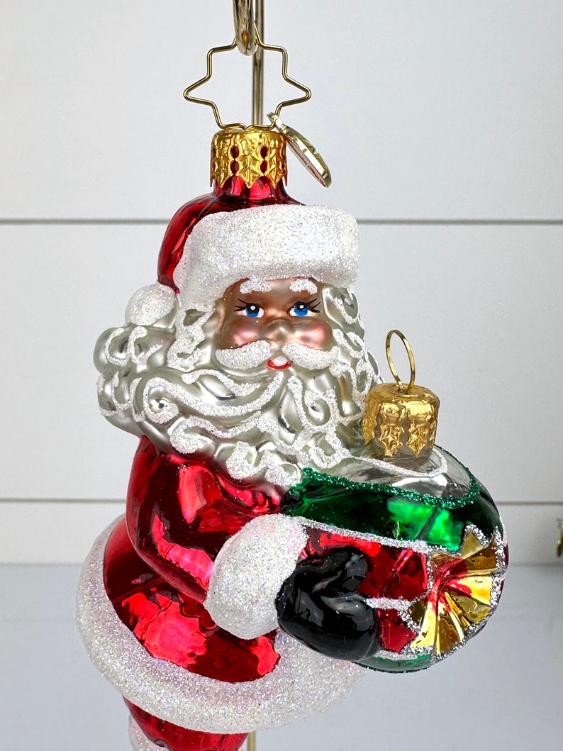 Christopher Radko Santa Balancing on Ornaments Glass Christmas Ornament CR image 2