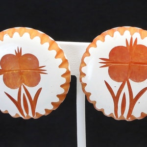 Vintage Carved Bakelite Overdyed Orange White Clip On Earrings Retro Flowers MCM