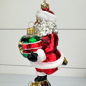 Christopher Radko Santa Balancing on Ornaments Glass Christmas Ornament CR image 4