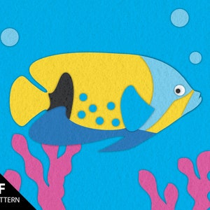May include: A yellow and blue fish with black spots swims in a blue ocean with pink coral. The fish has a large, round eye and a small mouth.