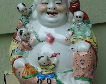 Happy Buddha Statue Famille Hand Painted Porcelain Figure Of A Smiling Buddha With Five Children Climbing On Him Playing 6-5/8"h