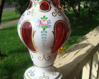 Antique BOHEMIAN CZECH VASE Cased cut to cranberry glass.White overlay.Hand Painted Roses with Gold trim Floral design.Cut top edges. Antique BOHEMIAN CZECH VASE Cased cut to cranberry glass.White overlay.Hand Painted Roses with Gold trim Floral design.Cut top edges.