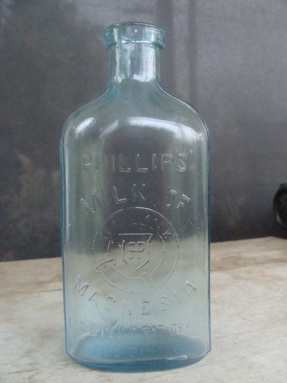 Phillips Milk Of Magnesia Glass Bottle Antique Phillips Milk of Magnesia Embossed Glass Bottle With | Etsy