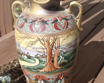 Antique Japanese Moriage Satsuma Amphora Vase Hand Painted Country Road Cottage Painting And Gold Accenting With Enamel Raised Beading