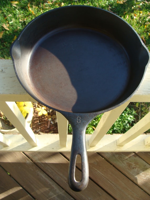 Advertised as Unmarked Wagner Cast Iron Pan - 6 on handle with unknown  rivet under handle. Is this a good buy? : r/castiron
