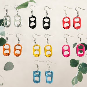 May include: Assortment of colorful earrings made from recycled aluminum pull tabs. The earrings are available in silver, black, red, orange, yellow, pink, and blue.