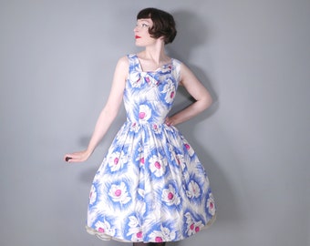 50s BLUE white and pink painterly FLORAL dress with ASYMMETRIC neck with bow and full skirt - S