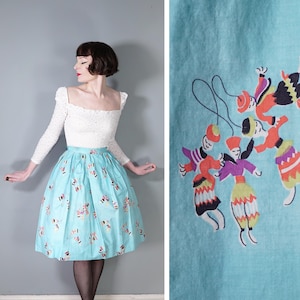 50s 1950s handmade NOVELTY pastel blue cotton full skirt with sweet Russian rag DOLL print - vintage swing / dirndl skirt - 26&quot;