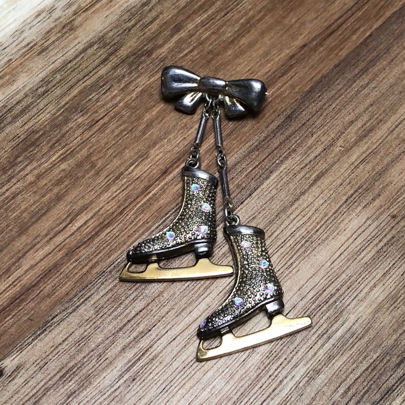 Ice Skating Rhinestone Pin Silver Tone Metal Brooch Bow Vintage Distressed Jewelry Small Label Pin Christmas