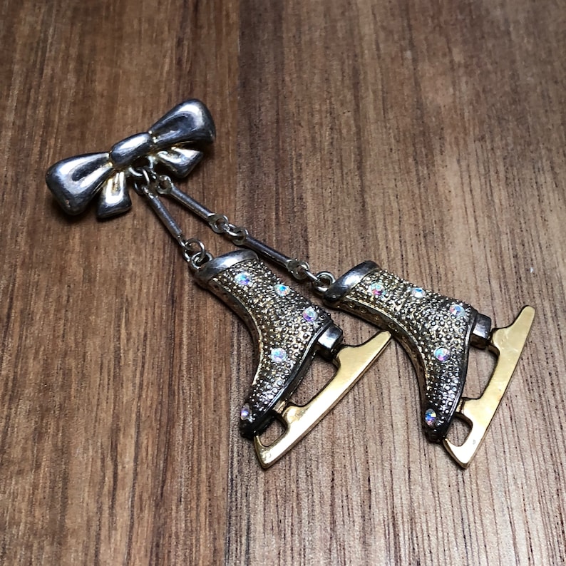 Ice Skating Rhinestone Pin Silver Tone Metal Brooch Bow Vintage Distressed Jewelry Small Label Pin Christmas