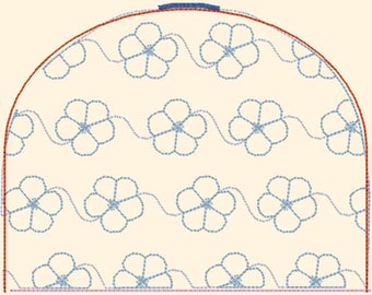 May include: A white fabric hat with a blue floral pattern and a blue trim around the top edge.