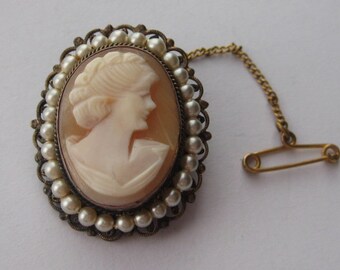 Vintage faux pearl carved shell cameo brooch