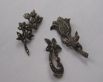 Collection of vintage sterling silver marcasite flower brooches
