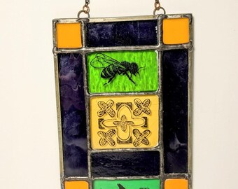 Small Stain Glass Bird, bee and cross.