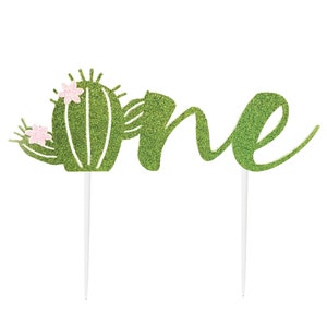 May include: Green glitter cactus cake topper with pink flowers and the word "one" in green glitter.