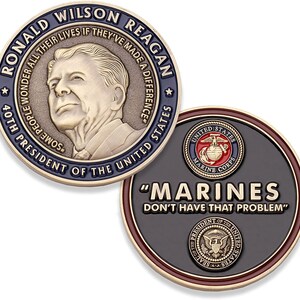 May include: A commemorative coin featuring Ronald Wilson Reagan, the 40th President of the United States. The coin has a portrait of Reagan and the text "Some people wonder all their lives if they've made a difference." The reverse side displays the Marine Corps emblem and the text "Marines don't have that problem."