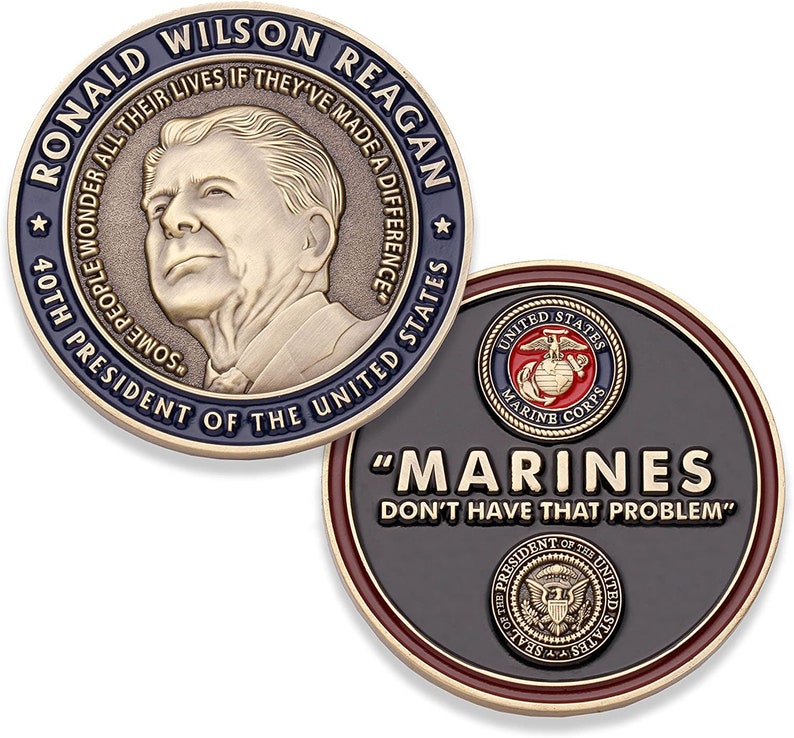 May include: A commemorative coin featuring Ronald Wilson Reagan, the 40th President of the United States. The coin has a portrait of Reagan and the text "Some people wonder all their lives if they've made a difference." The reverse side displays the Marine Corps emblem and the text "Marines don't have that problem."