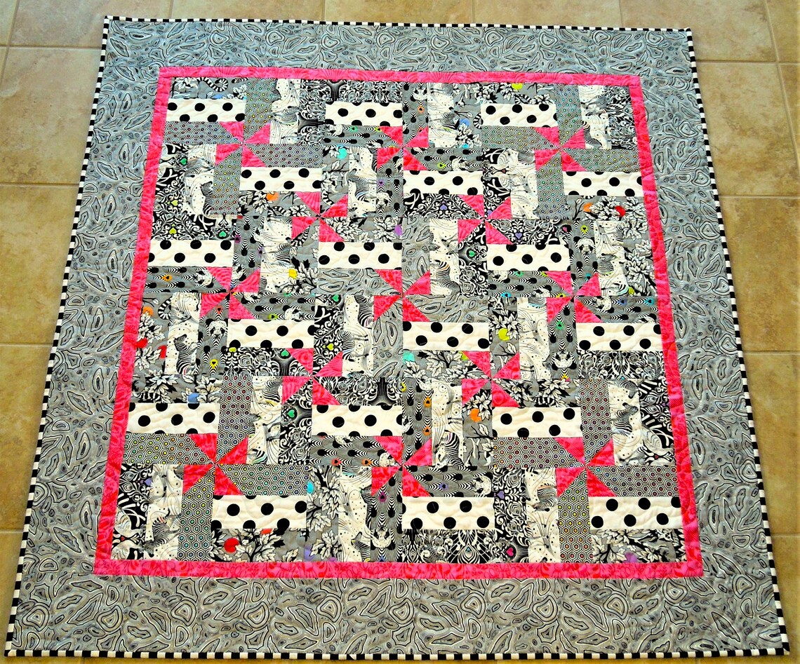 Black and White and Pink All Over is a Crib Size Quilt in Fabrics From