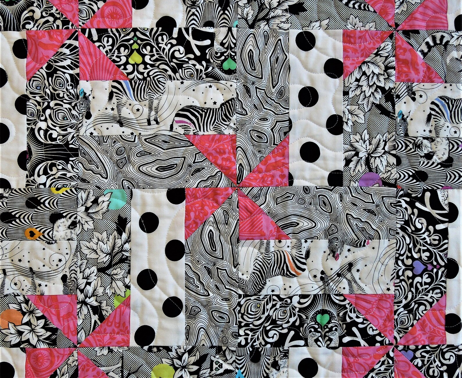 Black and White and Pink All Over is a Crib Size Quilt in Fabrics From