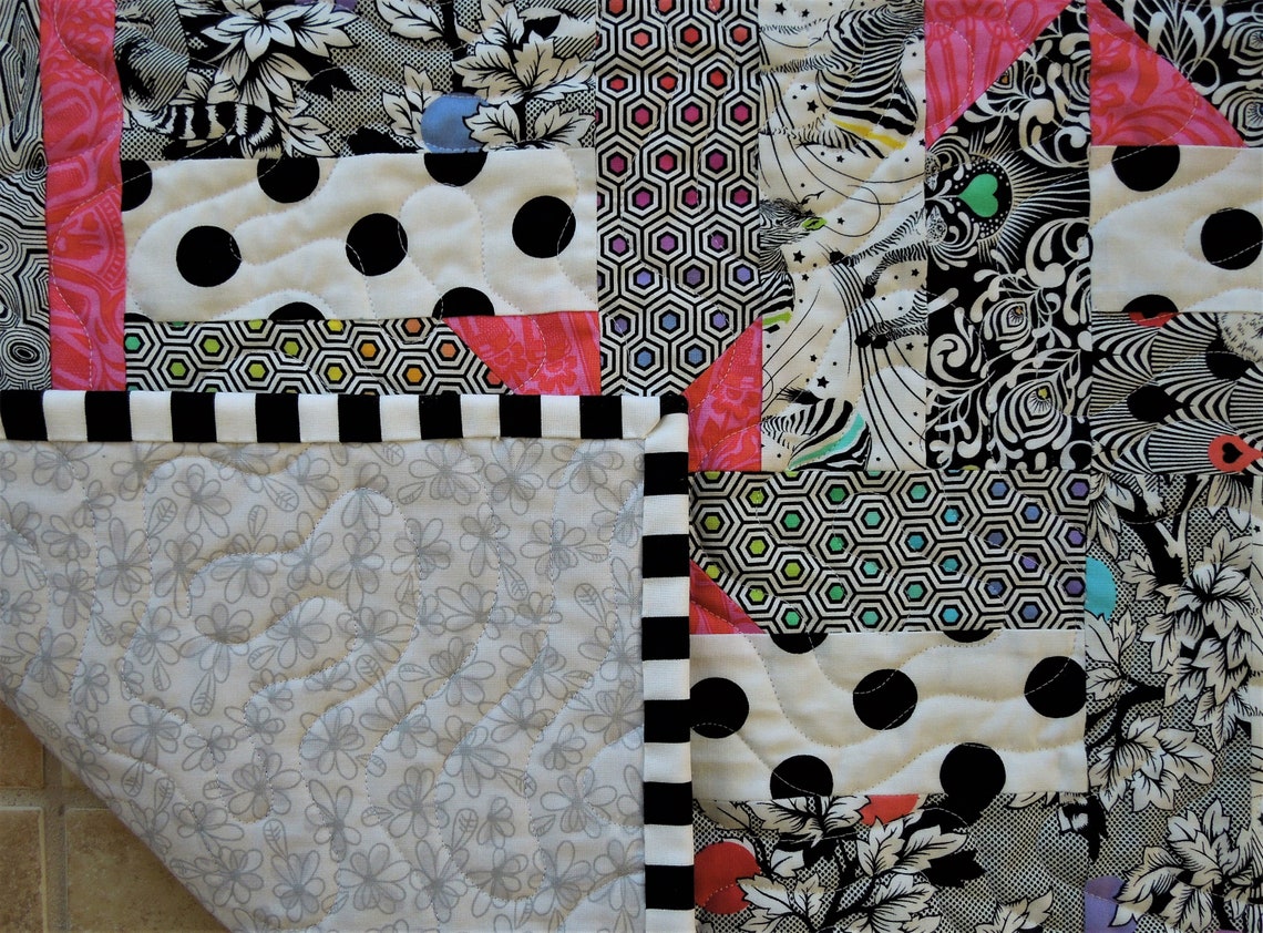 Black and White and Pink All Over is a Crib Size Quilt in Fabrics From
