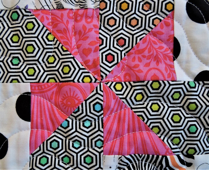 Black and White and Pink All Over is a Crib Size Quilt in Fabrics From