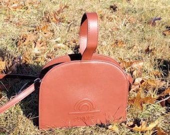 Ready to ship  The Plunge Shaped Vegan Leather Hand bag - Rusty brown with gold metal hardware