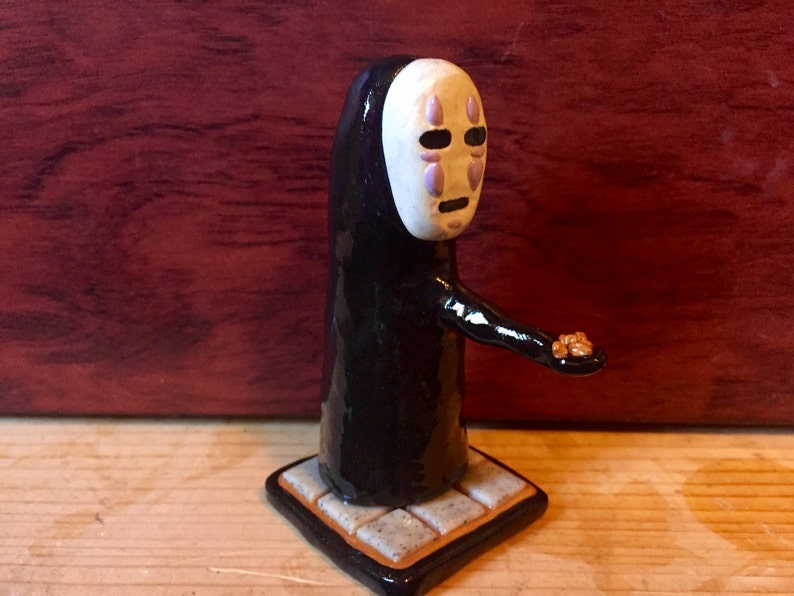 spirited away stone statue