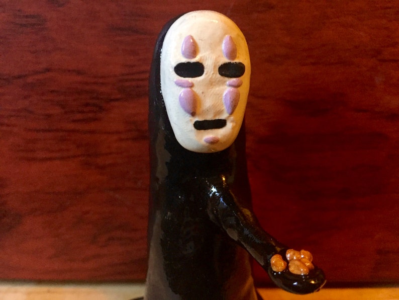 spirited away stone statue