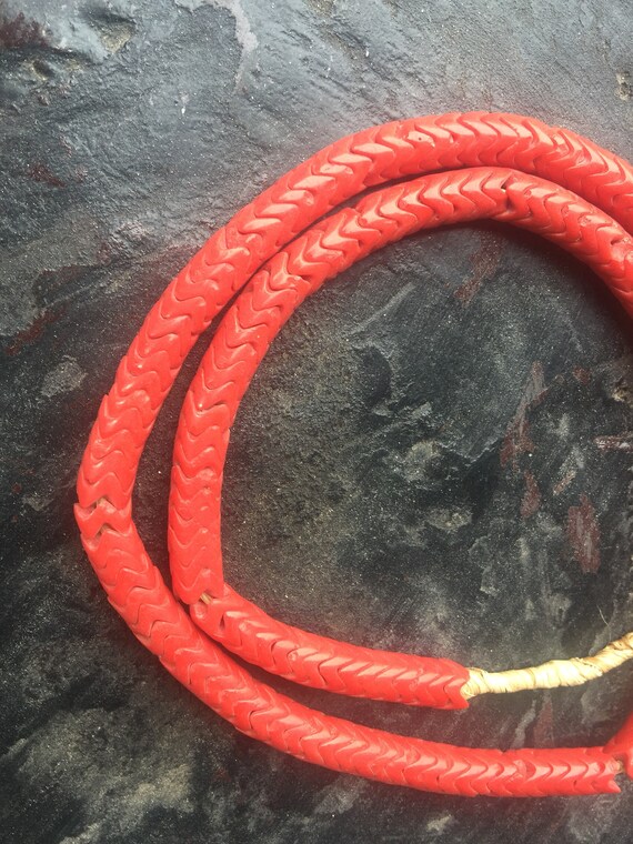Bohemian old Antique red glass snake beads origin