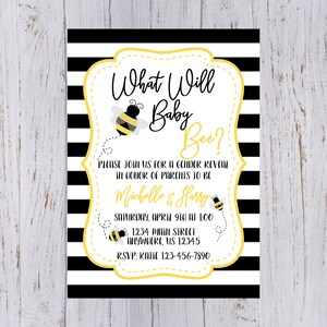 May include: A black and white striped gender reveal invitation with a yellow border. The invitation features a cartoon bee and the text "What Will Baby Bee?"  Please join us for a gender reveal in honour of parents to be Michelle & Harry. Saturday, April 9th at 1:00pm. 1234 Main Street, Anywhere, US 12345. RSVP: Katie 123-456-7890.