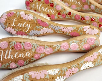 Personalised Hand-Painted Baby Brush with a choice of floral or strawberry design.