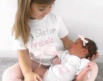 Matching Big/Little Sister T-Shirts. Envelope Sleeve Bodysuit or Top with Glitter and Bow Detail.