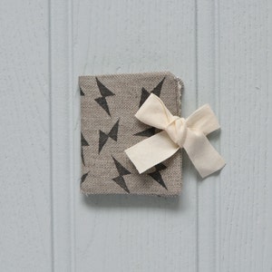 Lightning bolt printed needle book