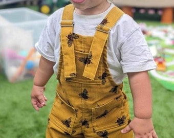 Childrens mustard Bees Dungarees in stretch corduroy