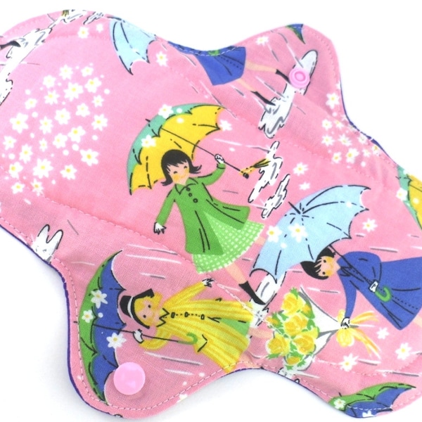 Cloth pad regular to heavy 8.5". Umbrella Puddles Pink print. Flat Cotton, towelling, PUL.