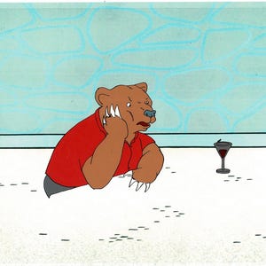 May include: A set of three ceramic mugs with a speckled, matte finish. The mugs are in shades of cream, light gray, and dark gray. Each mug has a simple, minimalist design and a rounded handle.