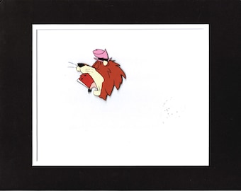 May include: A cartoon illustration of a red lion with a pink hat, wearing a red shirt and looking to the left. The lion is against a white background.