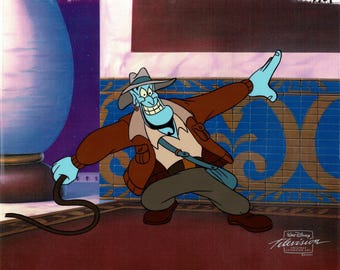 May include: A hand-painted animation cel featuring a blue-skinned character wearing a brown fedora, a brown jacket, and dark trousers. The character holds a black whip in one hand and strikes a pose against a blue and gold tiled wall background.